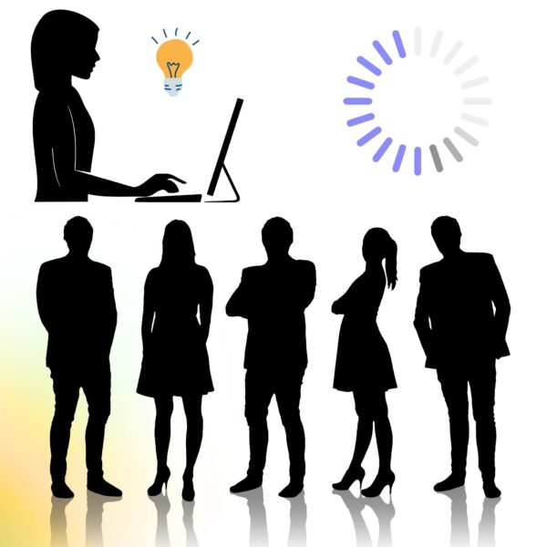 Silhouetted business team and AI-powered professional at computer, symbolizing AI for Business Development collaboration and innovation.