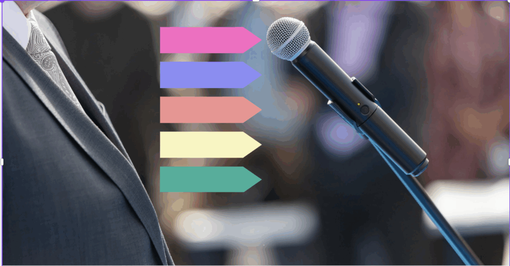 Close-up of a microphone and speaker in a suit, with colorful presentation pointers—representing an individual oral presentation.