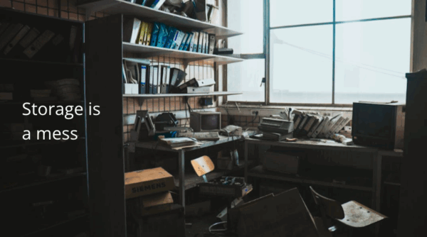 Dropbox pitch deck slide with a messy, cluttered office and the words “Storage is a mess”—an example of deck writing that tells a story visually.