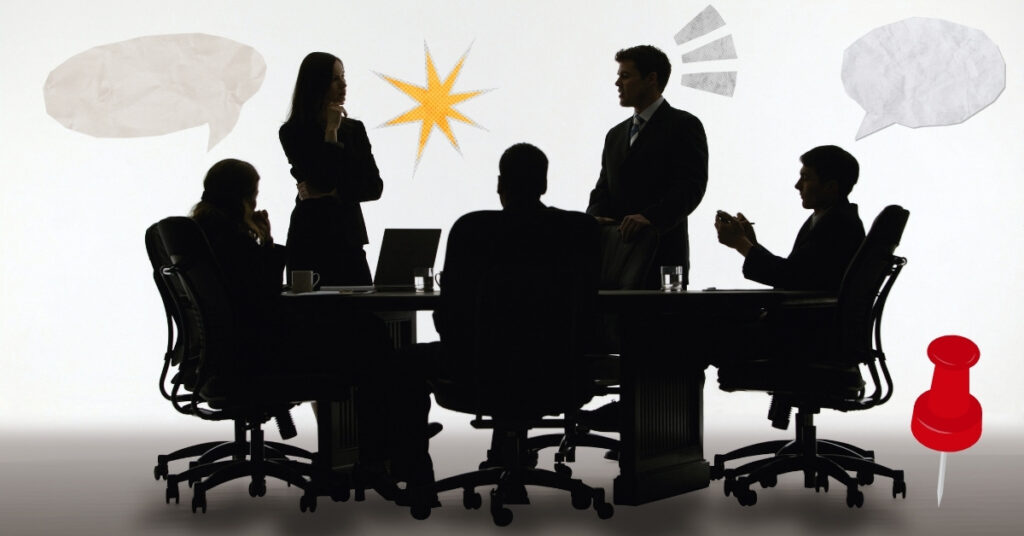 Business team in a meeting with speech bubbles and a red pin, representing the importance of agenda templates.