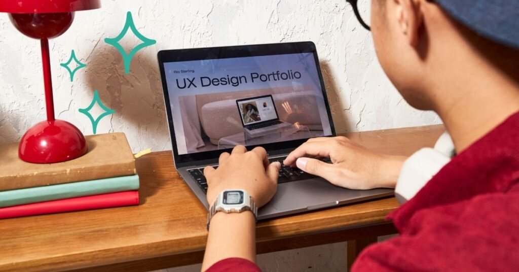 Person using a laptop to create a UX design portfolio, representing productivity and creativity with AI marketing tools.
